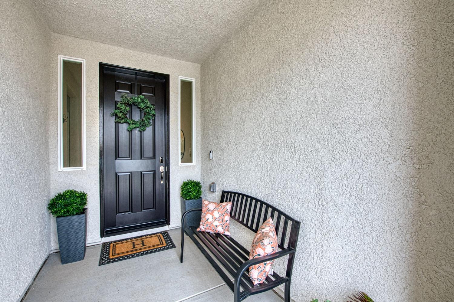 4722 Orchard Hills Road Madera, CA 93636 - Photo 3 of 28 a view of porch with a bench
