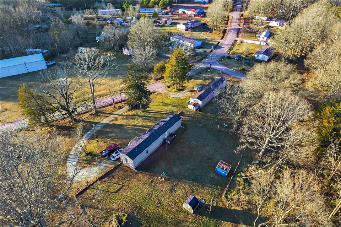 862 North Old Mill Road Easley, SC 29640 - Photo 19 of 24 An aerial view showcases a residential landscape with a mix of homes and natural elements.