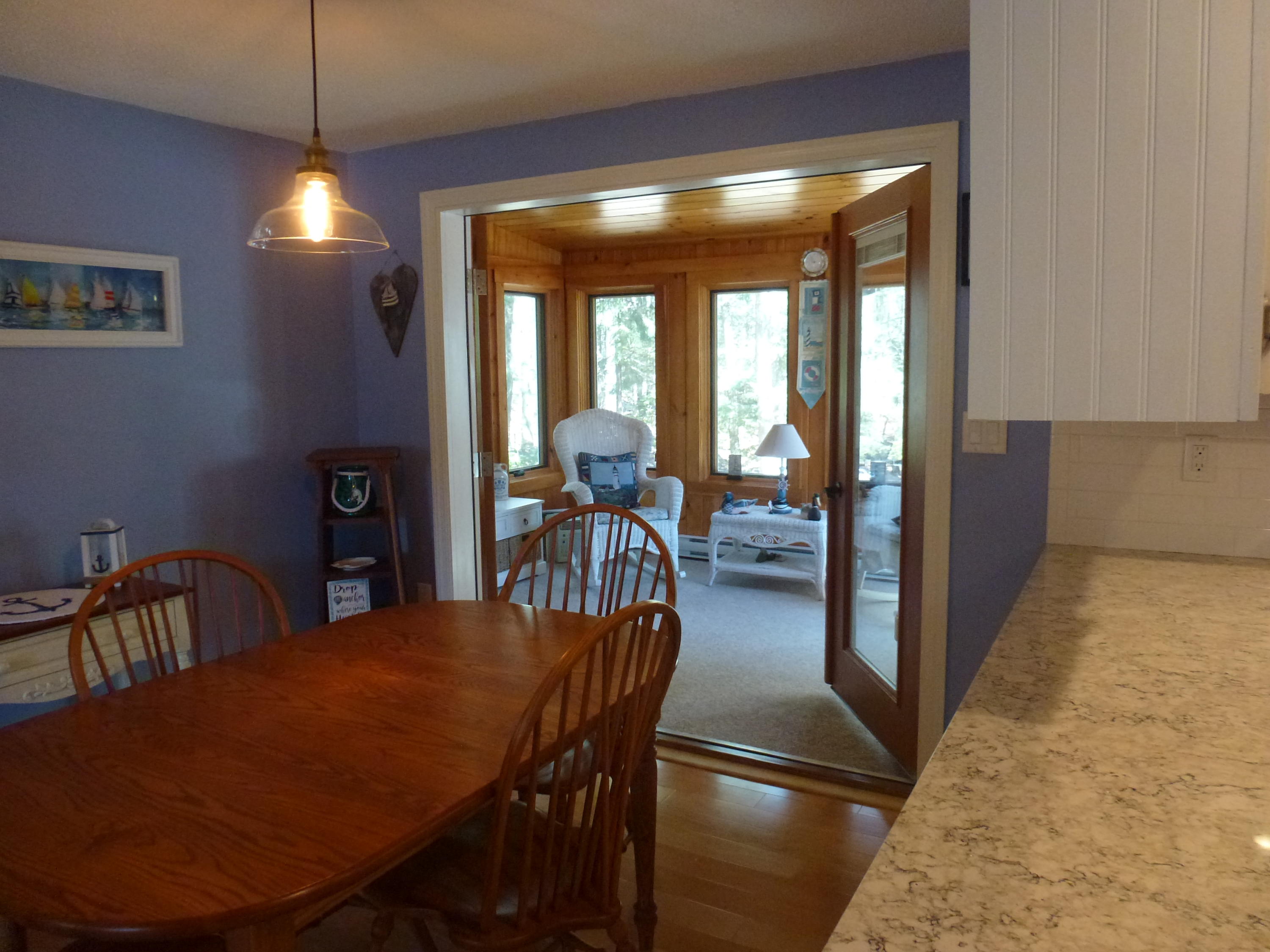 231 Flintlock Village Road, Unit 1 Wells, ME 04090 - Photo 16 of 30 Looking out to the 4 season sunroom