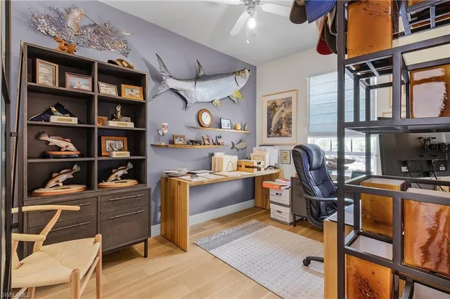 a view of a workspace with furniture