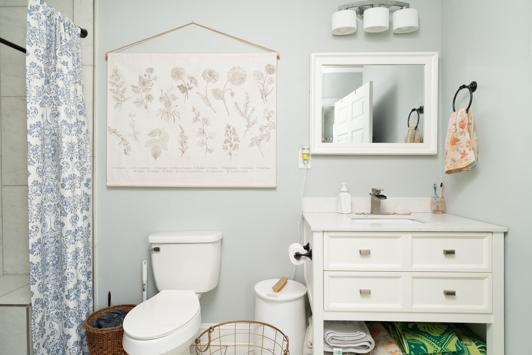 912 Barnabas Street Athens, TN 37303 - Photo 13 of 32 a bathroom with a sink vanity mirror and toilet