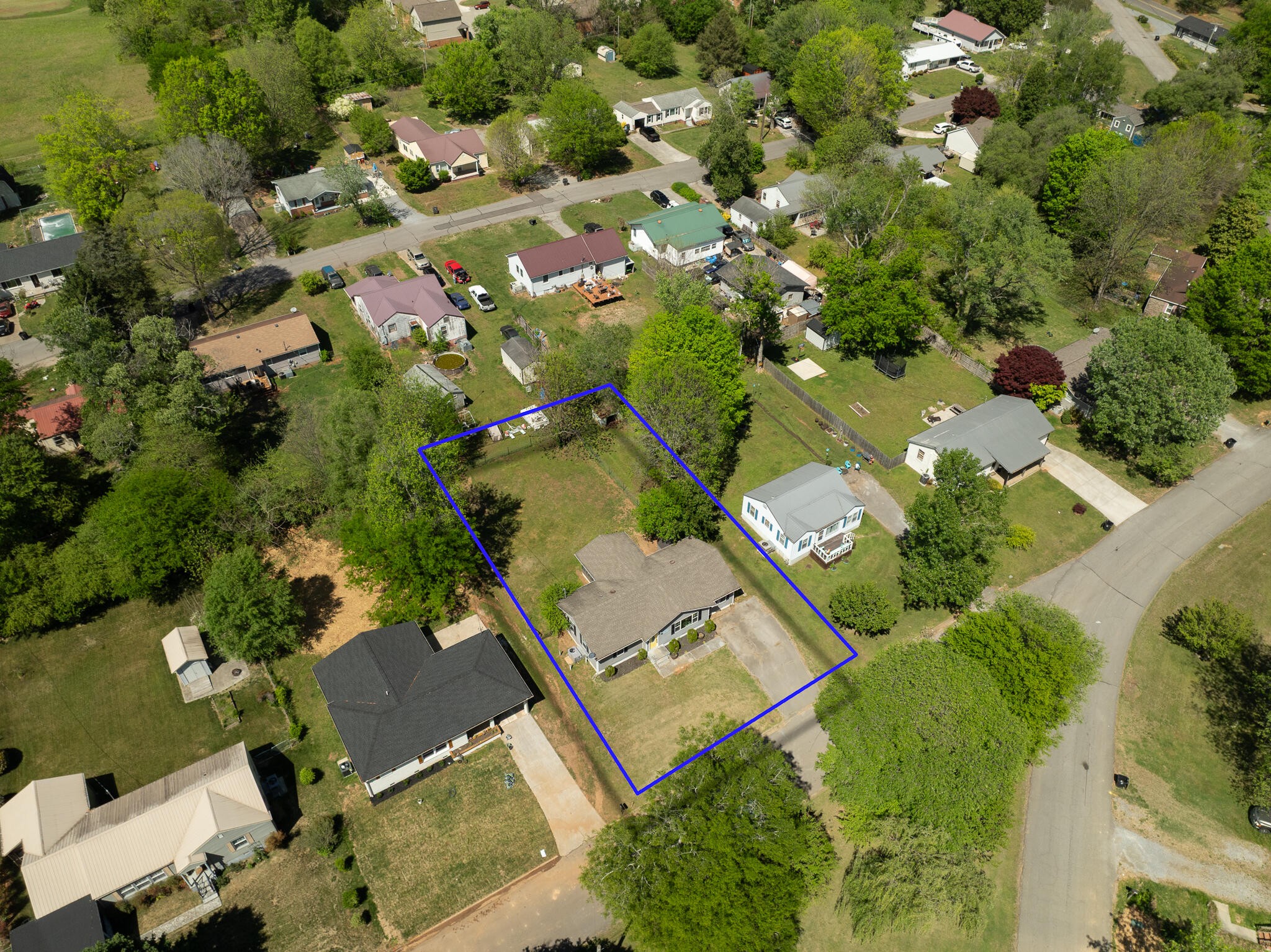 912 Barnabas Street Athens, TN 37303 - Photo 28 of 32 an aerial view of residential houses with outdoor space