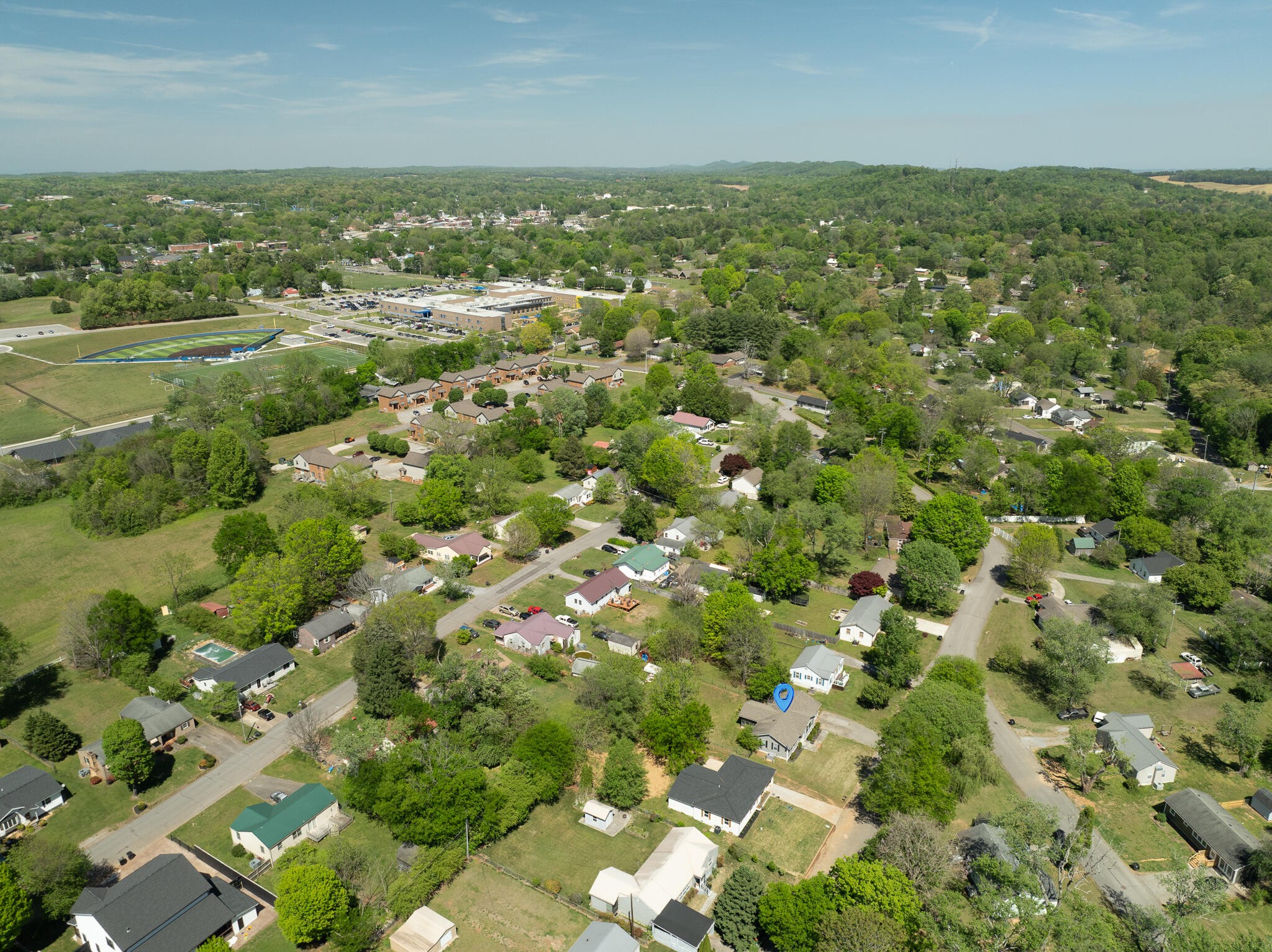 912 Barnabas Street Athens, TN 37303 - Photo 30 of 32 an aerial view of residential houses with outdoor space and trees