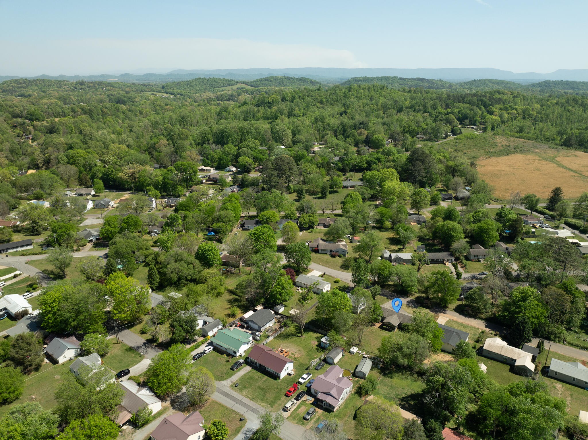 912 Barnabas Street Athens, TN 37303 - Photo 31 of 32 an aerial view of a houses with a yard