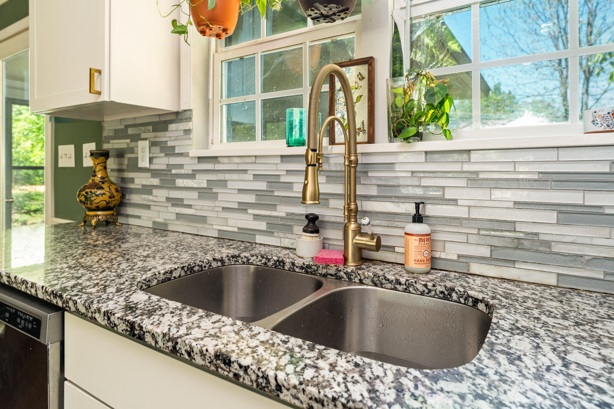 912 Barnabas Street Athens, TN 37303 - Photo 9 of 32 a kitchen counter top a sink and a window