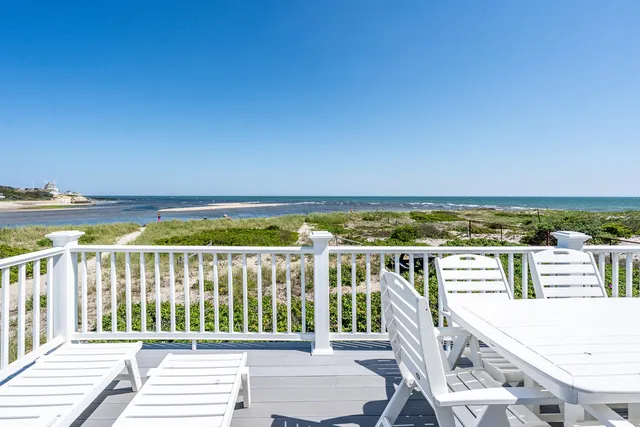 a view of a balcony with city view