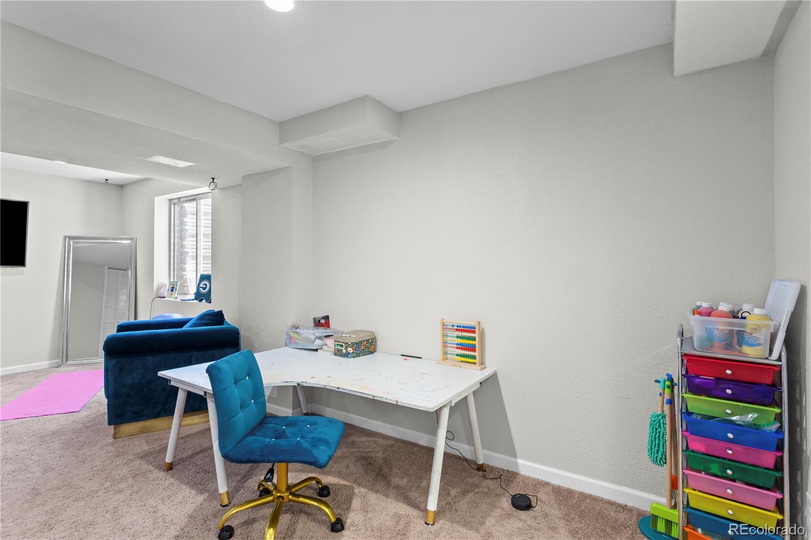 2212 Hyacinth Road Littleton, CO 80129 - Photo 34 of 44 a view of a workspace with furniture