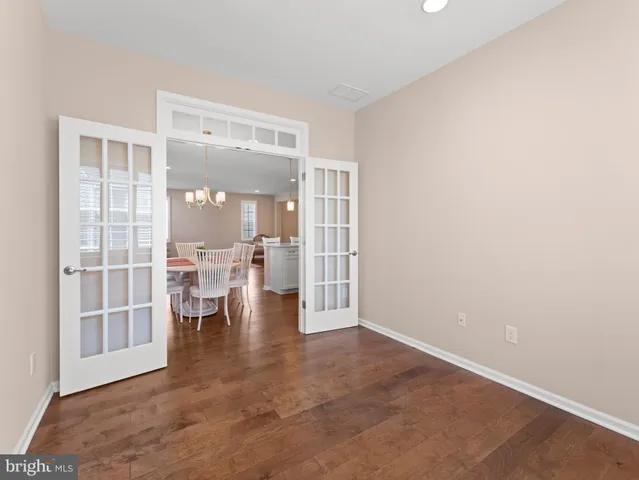 an empty room with large window