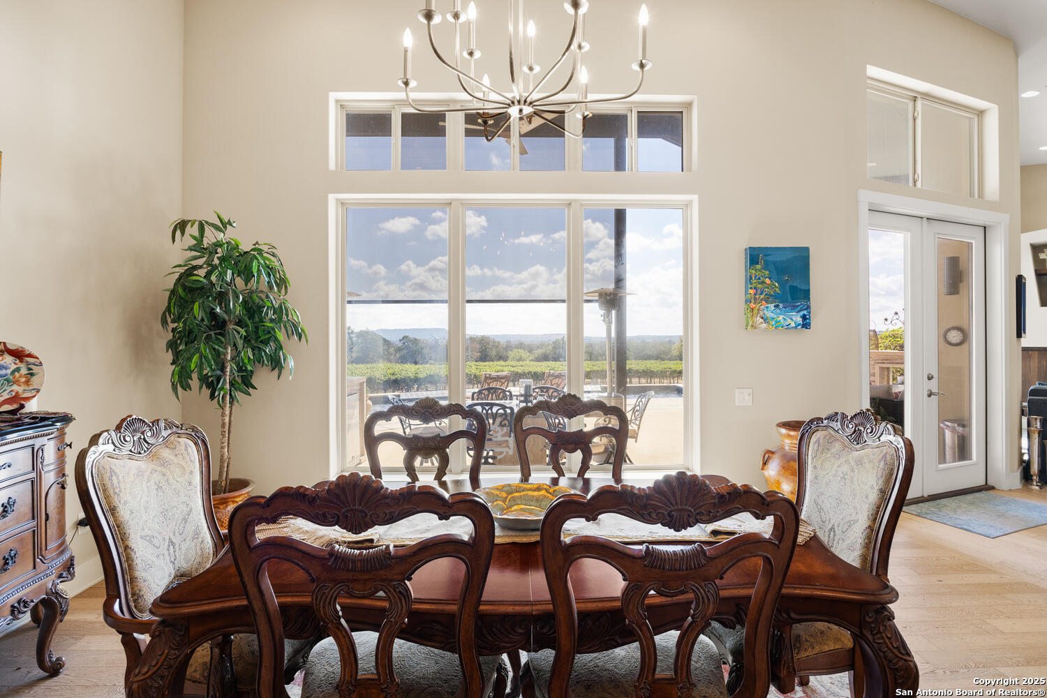 1758 Lincoln Smith Road Round Mountain, TX 78663 - Photo 14 of 50 a view of a dining room with furniture window and outside view