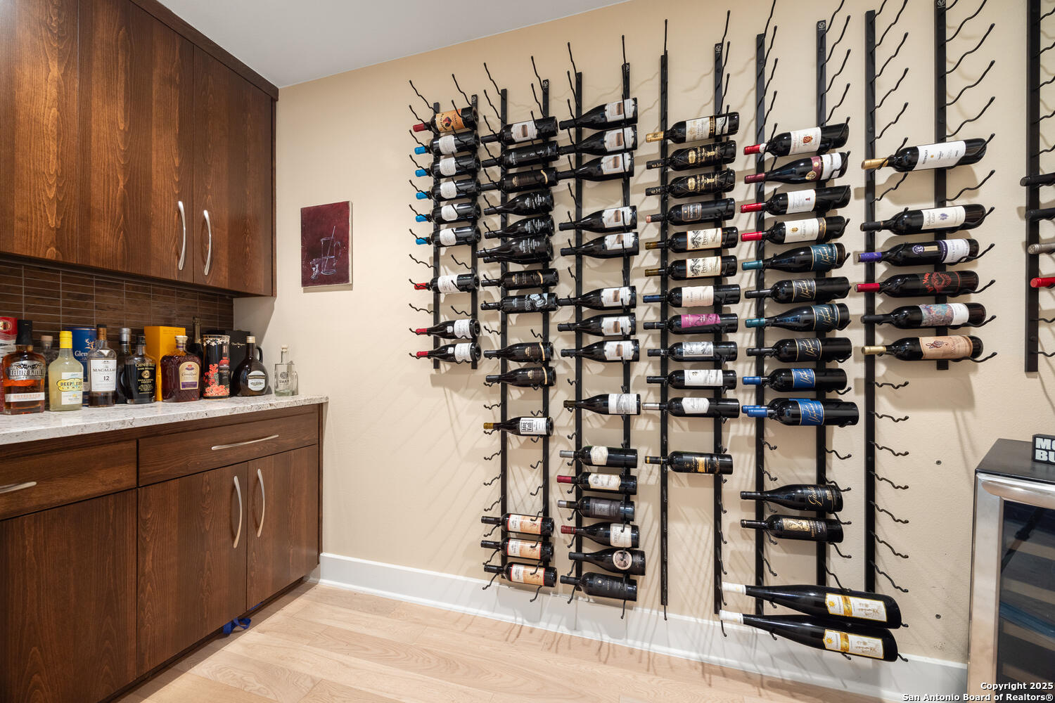 1758 Lincoln Smith Road Round Mountain, TX 78663 - Photo 19 of 50 a kitchen with a refrigerator and cabinets