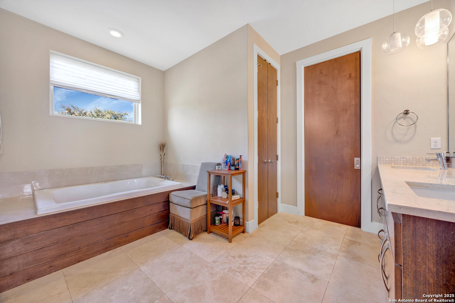 1758 Lincoln Smith Road Round Mountain, TX 78663 - Photo 25 of 50 a bedroom with a bed and a bathroom