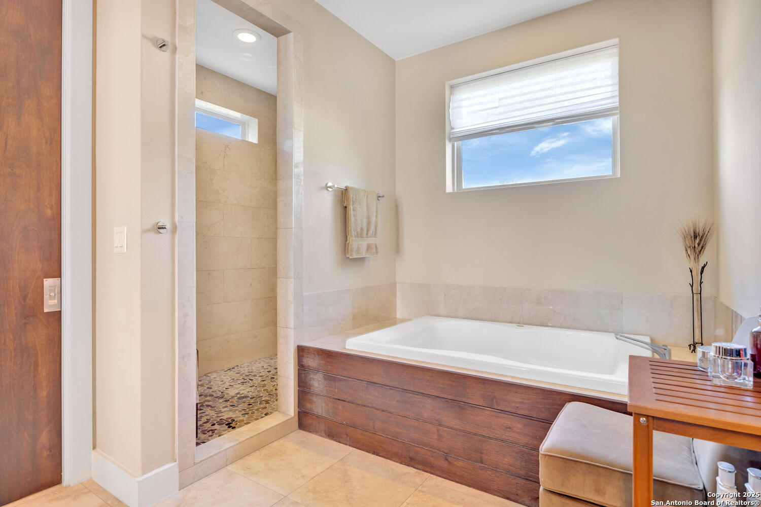 1758 Lincoln Smith Road Round Mountain, TX 78663 - Photo 26 of 50 a bathroom with a bathtub and a shower