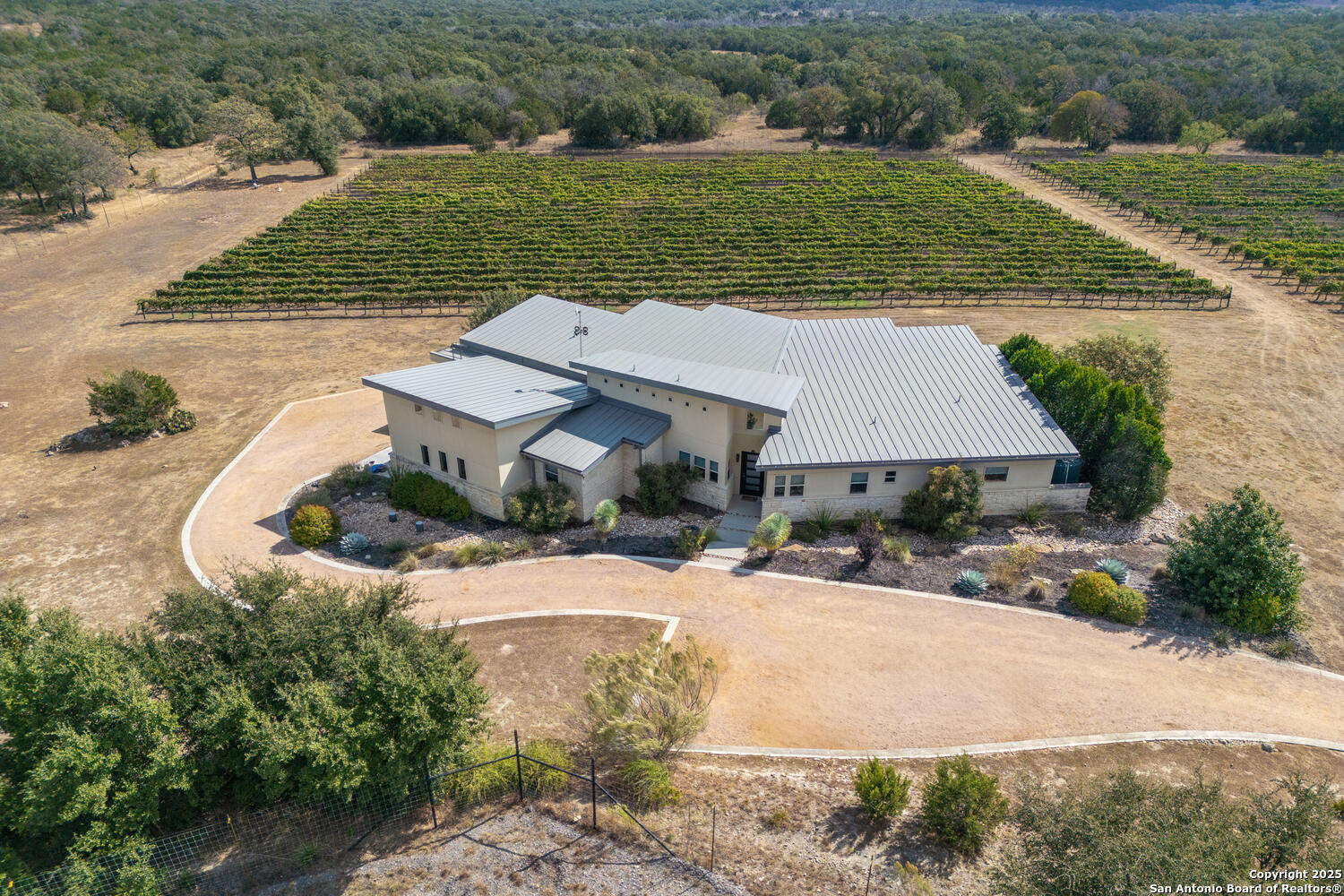 1758 Lincoln Smith Road Round Mountain, TX 78663 - Photo 3 of 50 an aerial view of a house