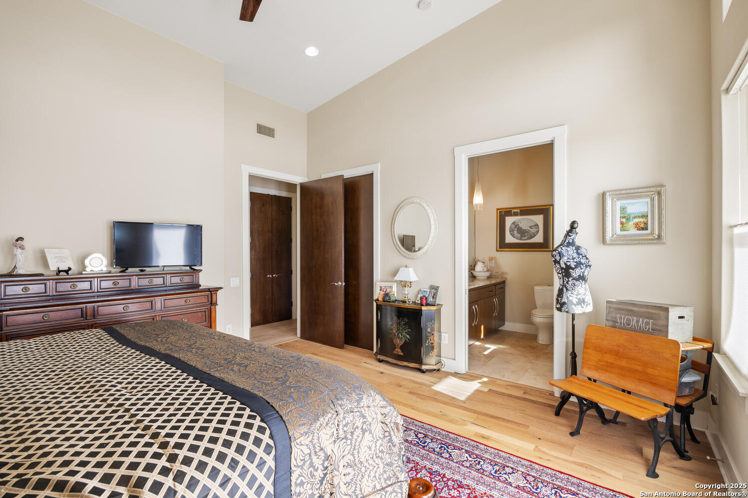 1758 Lincoln Smith Road Round Mountain, TX 78663 - Photo 31 of 50 a bedroom with a bed and a dresser in it