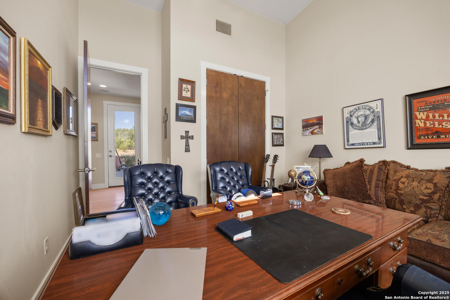 1758 Lincoln Smith Road Round Mountain, TX 78663 - Photo 34 of 50 a living room with furniture rug and lamp