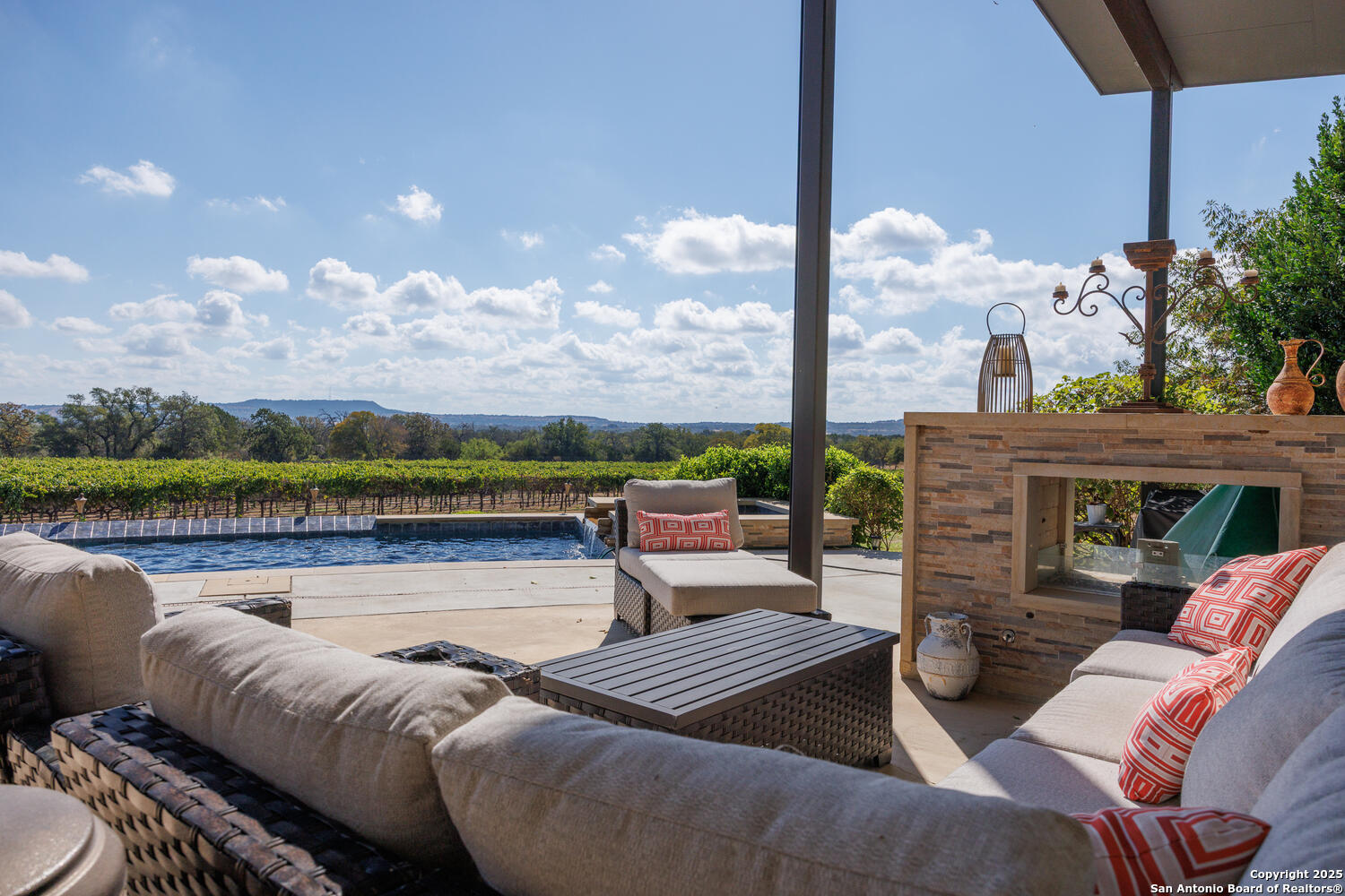 1758 Lincoln Smith Road Round Mountain, TX 78663 - Photo 40 of 50 a view of a terrace with couches and lounge chairs