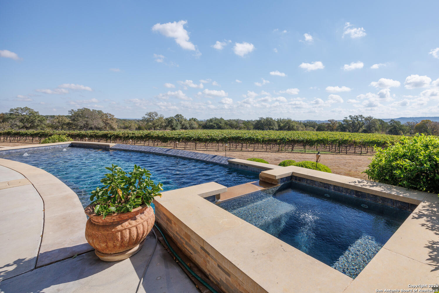 1758 Lincoln Smith Road Round Mountain, TX 78663 - Photo 41 of 50 a view of a swimming pool and lounge chair
