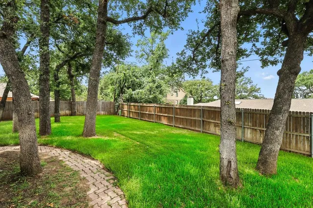 a view of a backyard with a garden