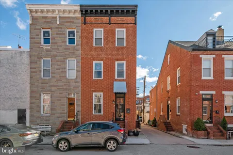 a car parked in front of a building