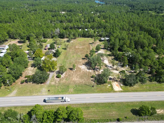 a view of a yard with an outdoor space