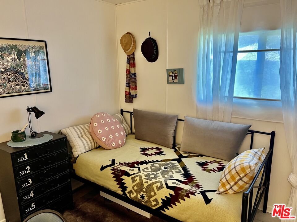 2744 West Rialto Avenue, Unit 49 Rialto, CA 92376 - Photo 22 of 40 a living room with furniture