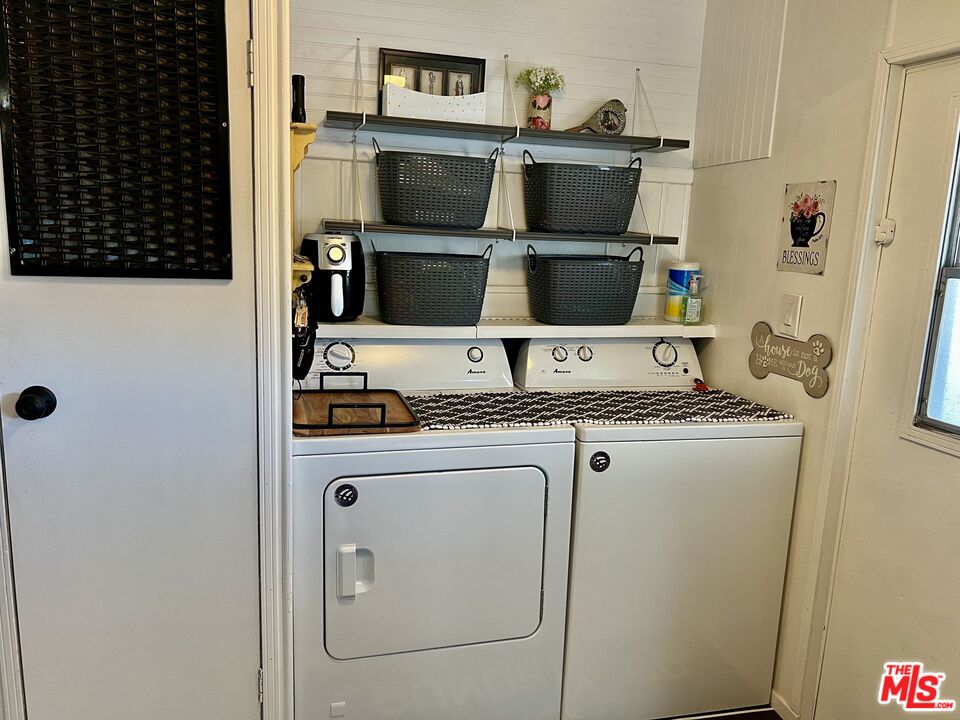 2744 West Rialto Avenue, Unit 49 Rialto, CA 92376 - Photo 28 of 40 a utility room with dryer and washer
