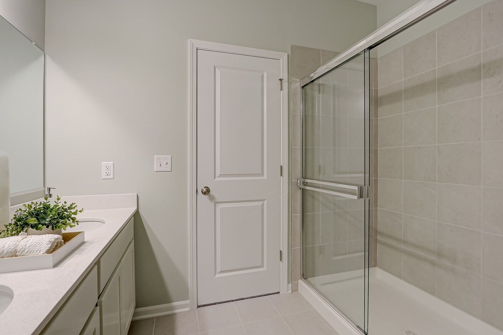 548 Endicott Road South Elgin, IL 60177 - Photo 27 of 32 a bathroom with a shower and a sink