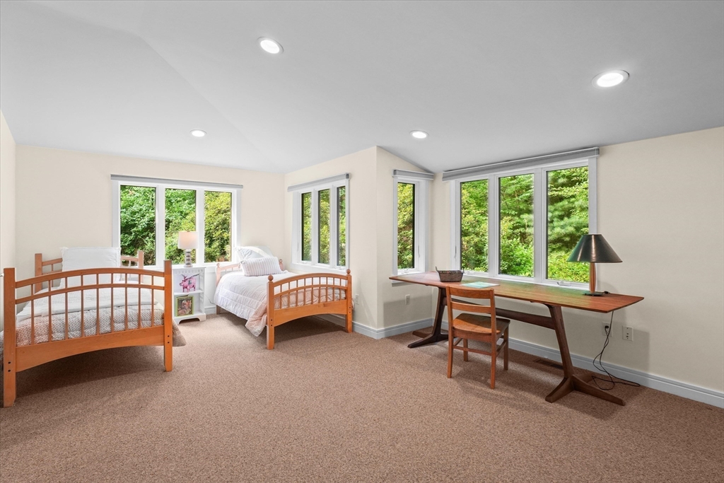 146 Spofford Road Boxford, MA 01921 - Photo 16 of 42 a bedroom with a bed and a window