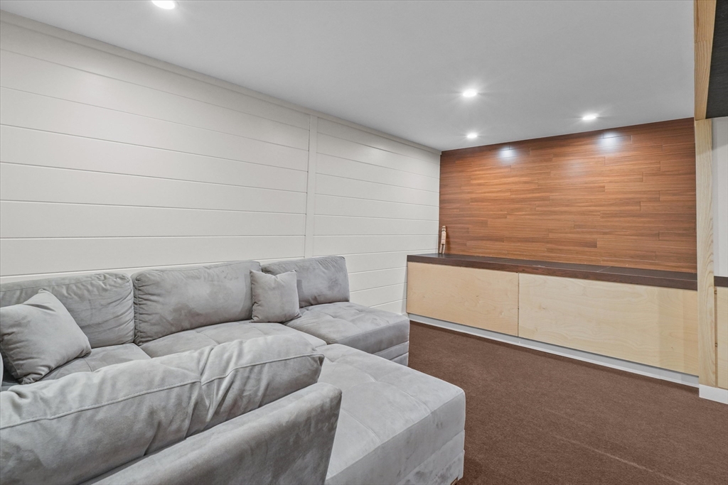 146 Spofford Road Boxford, MA 01921 - Photo 32 of 42 a living room with furniture and a rug