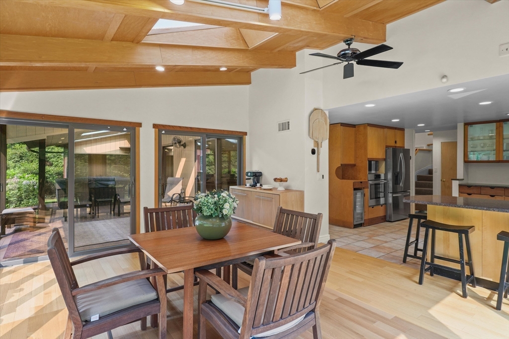 146 Spofford Road Boxford, MA 01921 - Photo 4 of 42 a view of a dining room with furniture and a potted plant