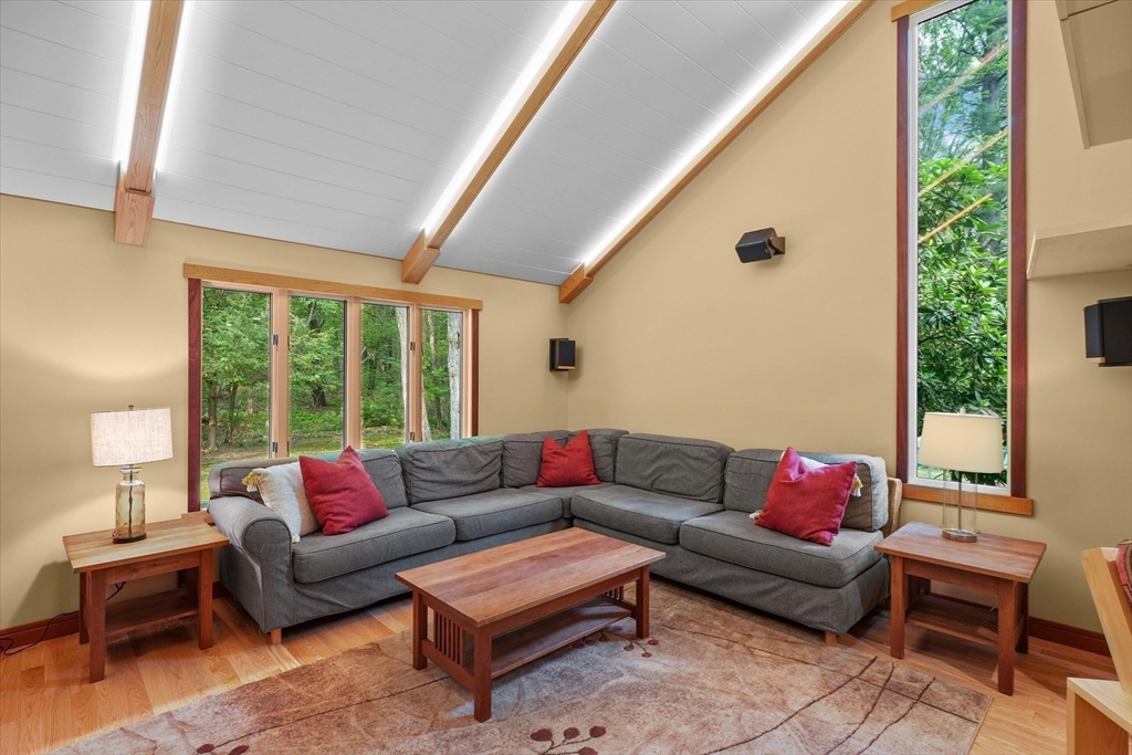 146 Spofford Road Boxford, MA 01921 - Photo 10 of 42 a living room with furniture and a large window