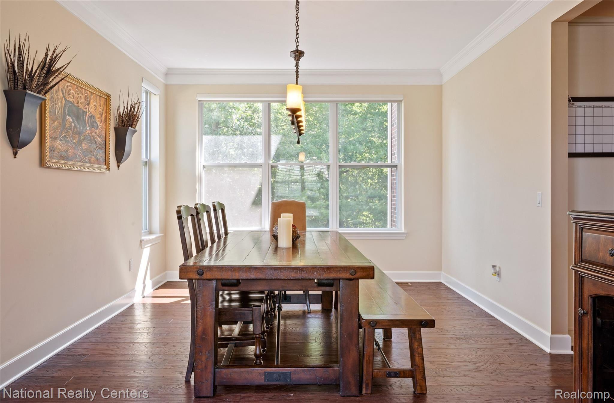 4552 Oakhurst Ridge Road Clarkston, MI 48348 - Photo 15 of 53 Dining room with beautiful crown molding