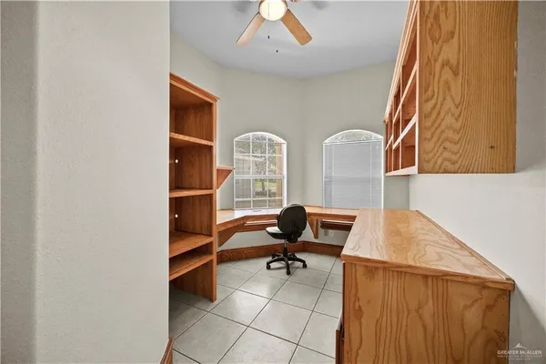 a bathroom with a granite countertop sink a large mirror and a shower