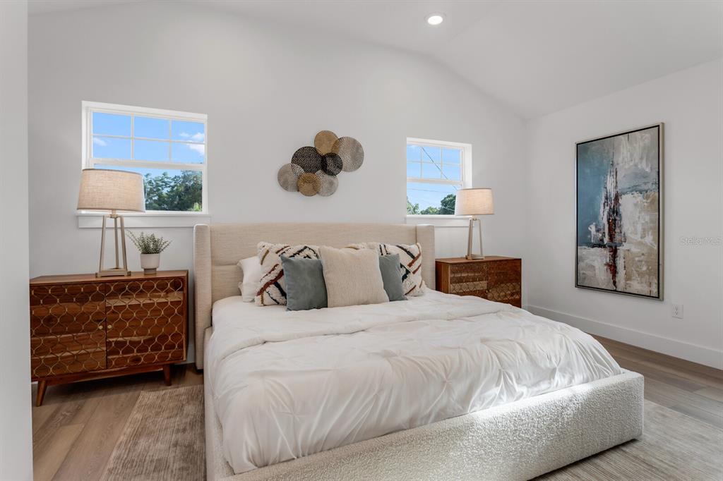 1912 West Chestnut Street Tampa, FL 33607 - Photo 20 of 30 a bedroom with a bed and a painting on the wall