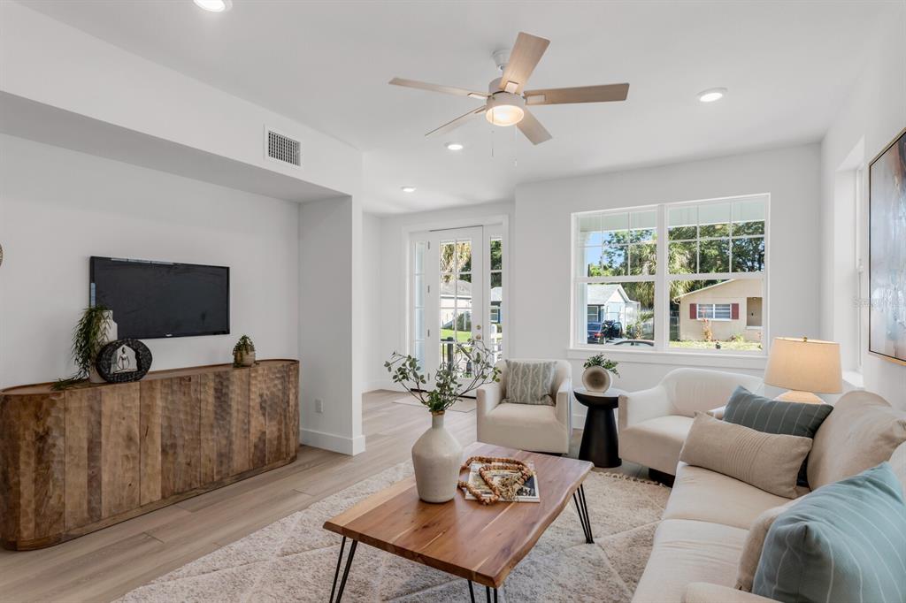 1912 West Chestnut Street Tampa, FL 33607 - Photo 2 of 30 a living room with furniture and a flat screen tv