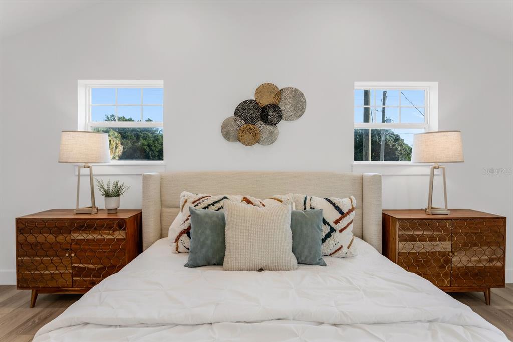 1912 West Chestnut Street Tampa, FL 33607 - Photo 22 of 30 a bed room with a bed and a night stand