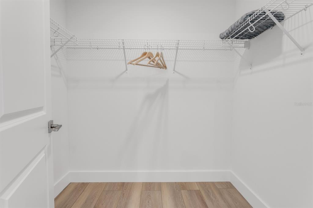 1912 West Chestnut Street Tampa, FL 33607 - Photo 28 of 30 a view of walk in closet with empty racks