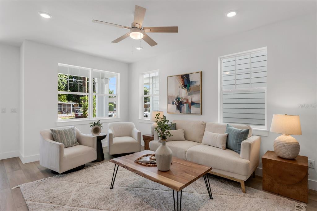 1912 West Chestnut Street Tampa, FL 33607 - Photo 3 of 30 a living room with furniture and a large window