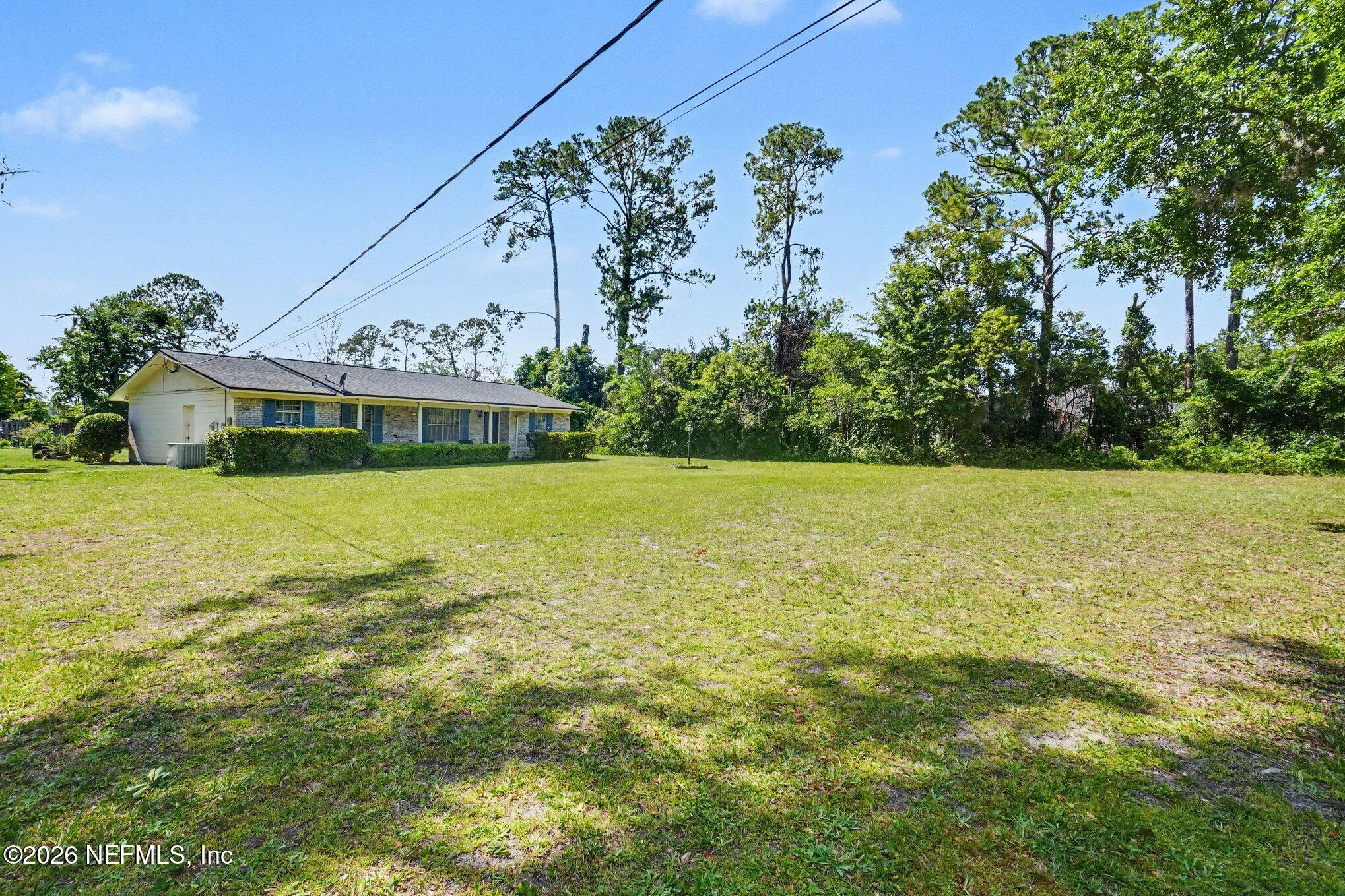3934 Spring Glen Road Jacksonville, FL 32207 - Photo 2 of 29 002_file_1980