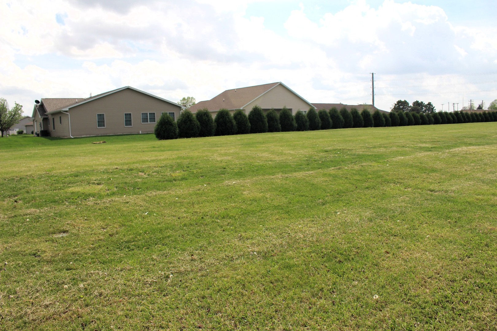 a house view with a garden space