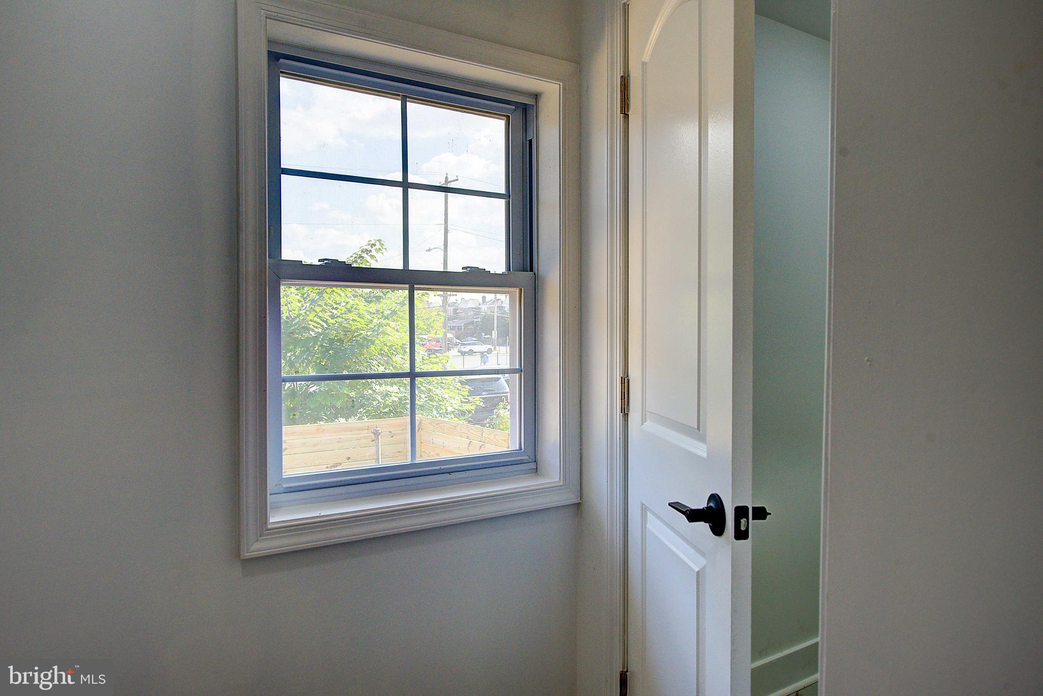5736 Reedland Street Philadelphia, PA 19143 - Photo 8 of 22 a view of a bathroom with a window