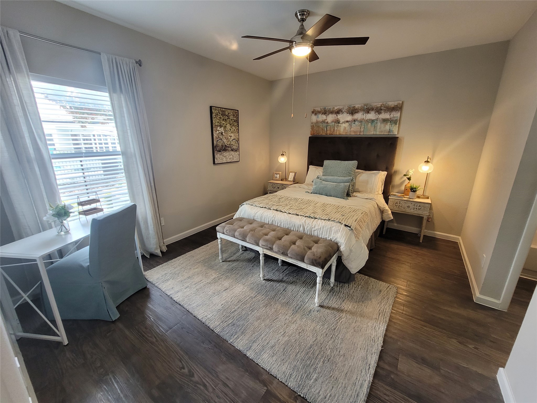 7250 West Greens Road, Unit 517 Houston, TX 77064 - Photo 9 of 12 a living room with a bed furniture and a window