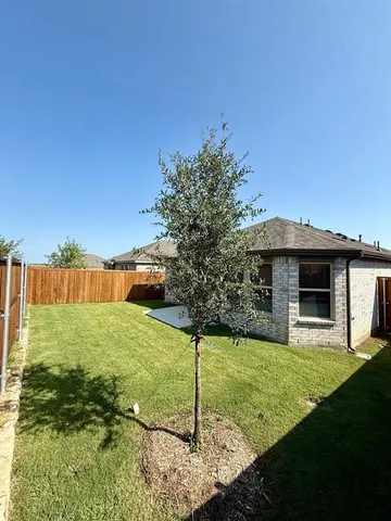 a house view with a garden space