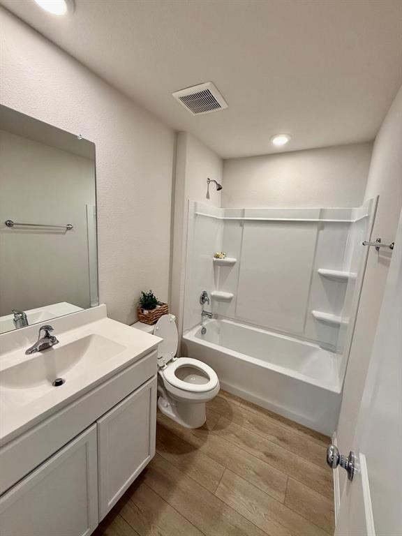 14123 Maida Drive Pilot Point, TX 76258 - Photo 7 of 12 a bathroom with a sink a toilet and shower