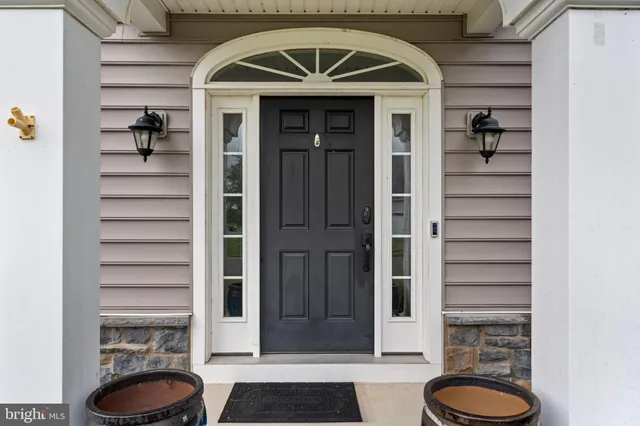 a front view of a house with a door