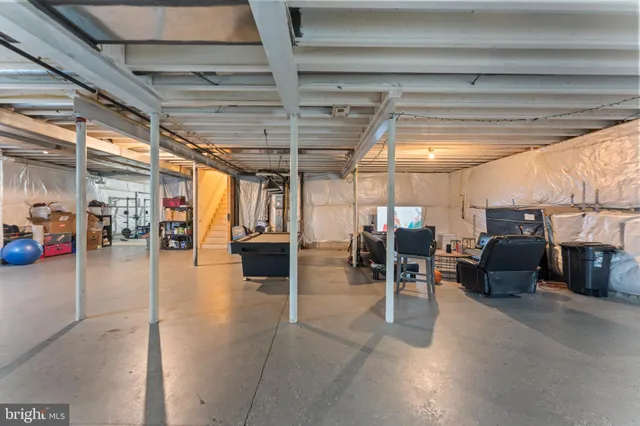 a view of a gym with a couch