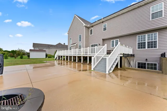 a view of a house with a roof deck