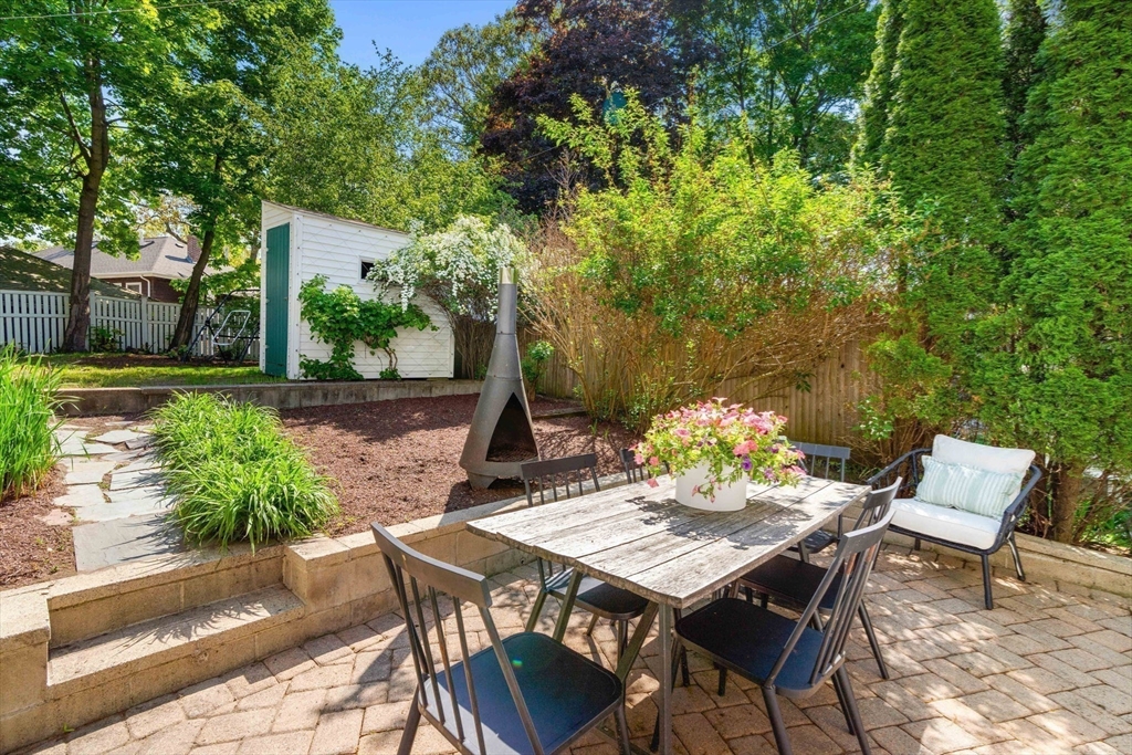 34 Avalon Road Milton, MA 02186 - Photo 28 of 42 a view of an outdoor space with table and chair