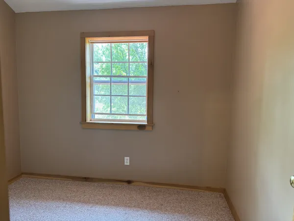 an empty room with a window