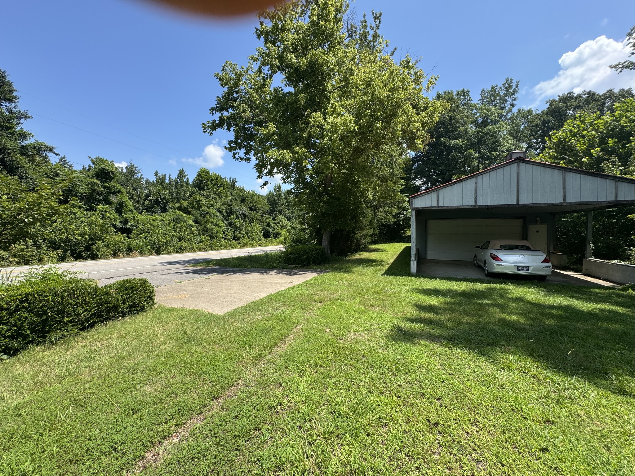 11175 Highway 147 Stewart, TN 37175 - Photo 20 of 29 a view of a tiny house with a yard